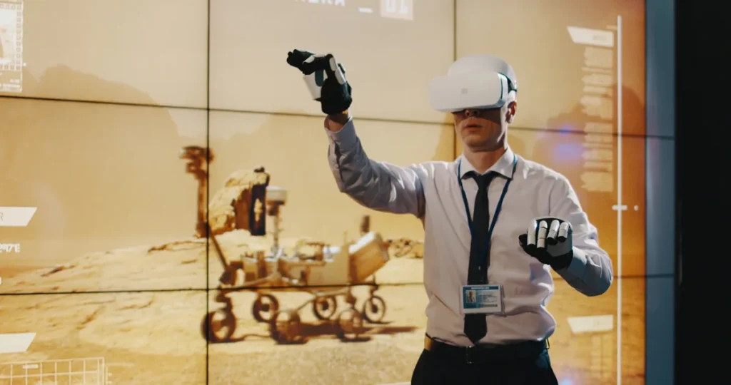 Beneficios escape room empresas: participante con gafas de realidad virtual frente a una pantalla durante Cybercorp