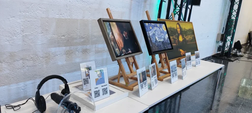 Escape room para empresas en Toledo: cuadros en caballetes con auriculares y pistas preparados para El Misterio de Van Gogh