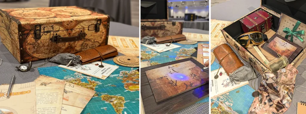 Escape room para empresas en Toledo: cofre, mapas y documentos de El Legado Perdido preparados sobre una mesa