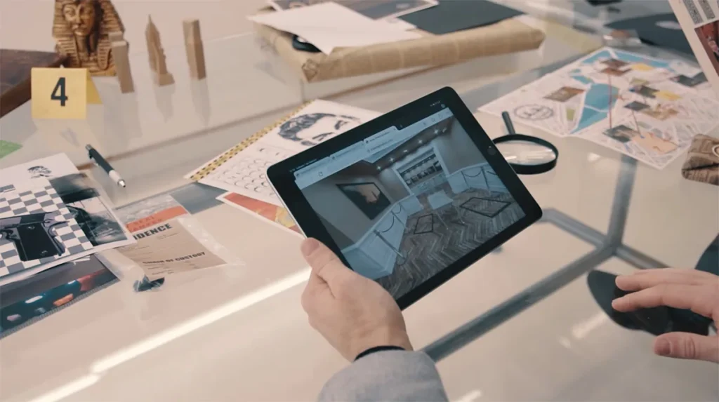 Escape room para empresas en Segovia: expediente, fotos y pistas de un juego de investigación sobre la mesa